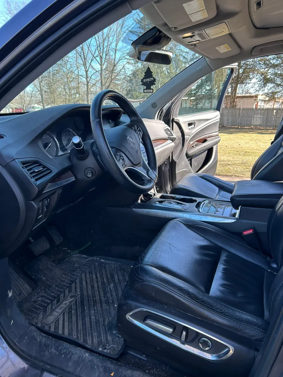 Acura MDX driver seat after an interior detail