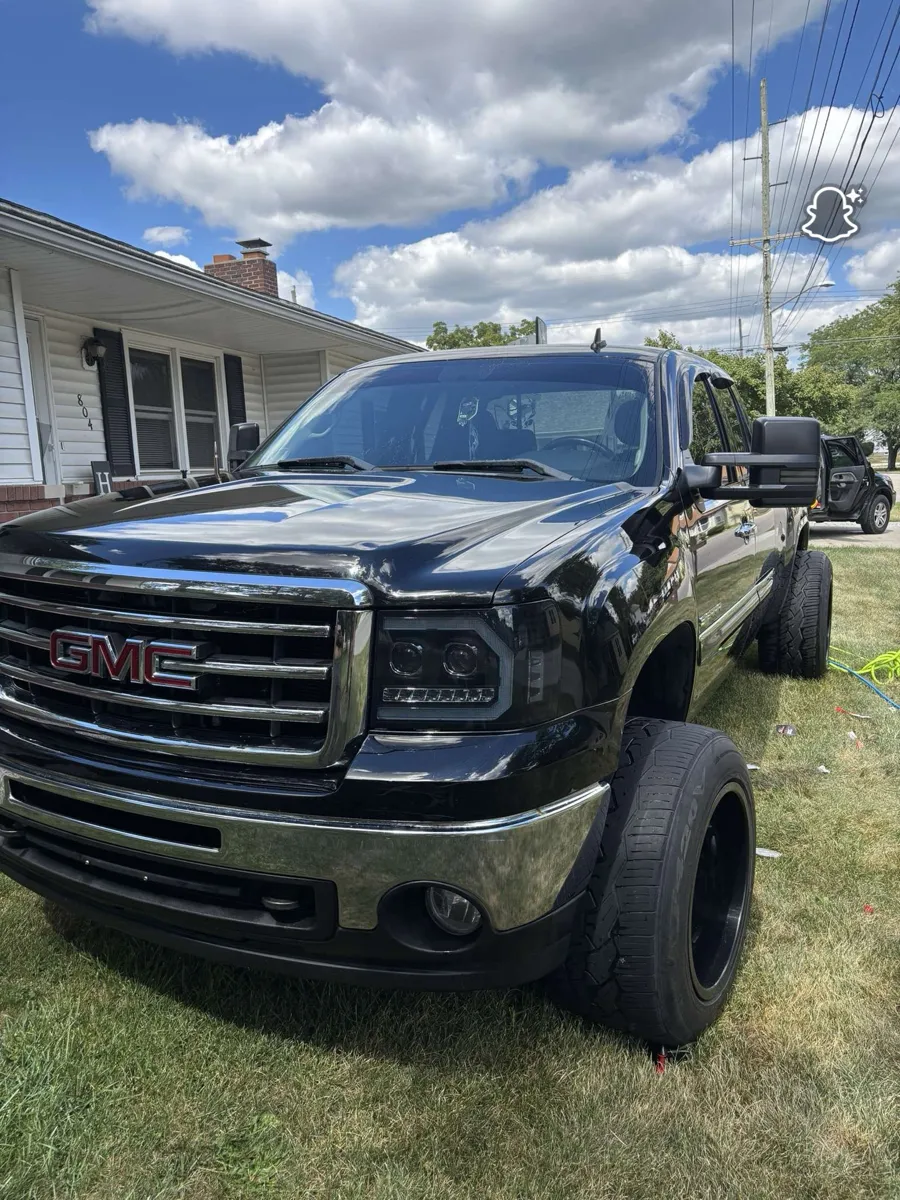 Black GMC Sierra after an exterior wash