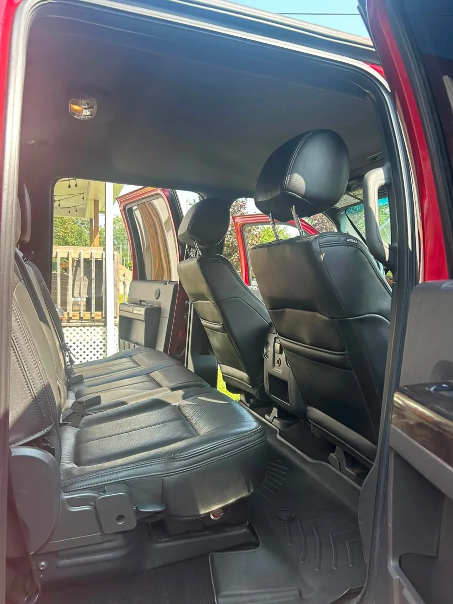 Black truck rear seat after an interior detail