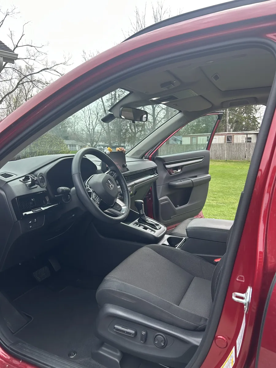 Red SUV driver seat after detailing